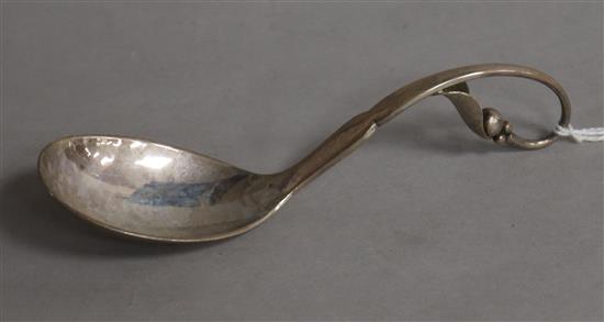 A late 1920s Georg Jensen Danish sterling silver preserve spoon, no. 21, with leaf and berry terminal, 12.2cm.